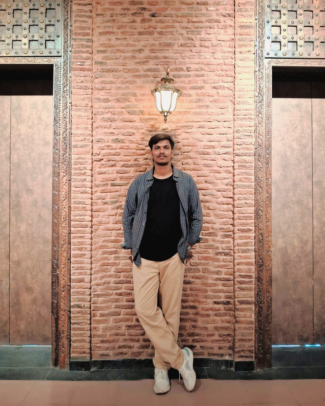 A portrait of ASAD QAIYYUM KHAN